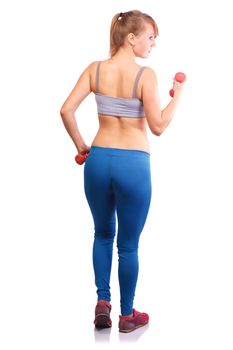 The girl goes in for sports with dumbbells on a white background.