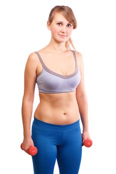 The girl goes in for sports with dumbbells on a white background.