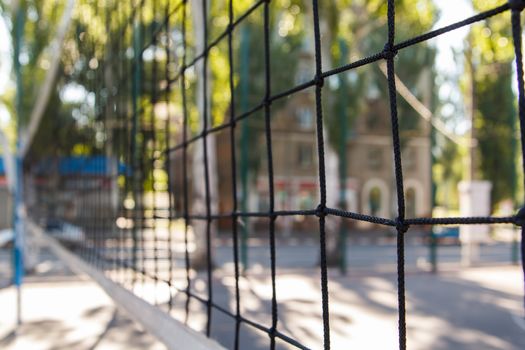 Rusty old armored fence. The small depth of field.