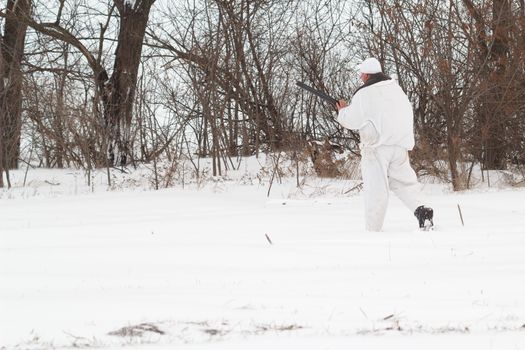 The hunter on winter hunting hare.