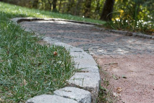 Photo of the old, dark stone pavement.