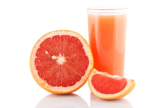 Glass of grapefruit juice isolated on white.