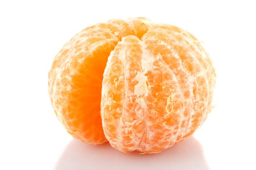 One juicy tangerine peeled on a white background.