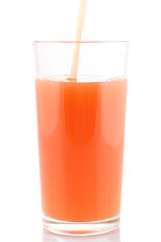 Glass of grapefruit juice isolated on white.