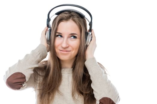 horizontal portrait of young girl with headphones isolated on white background