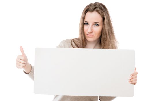 happy woman with a poster on a white background in the studio