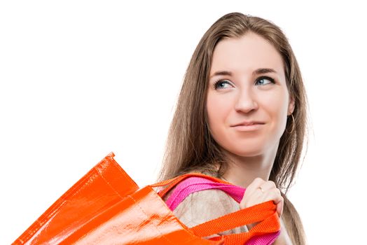 close-up portrait of a girl with shopping bags on white background