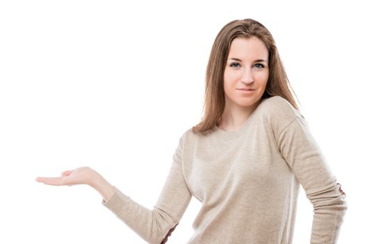 beautiful girl holds a palm on a white background, space on the left