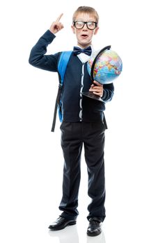 boy with a globe with a good idea on a white background posing