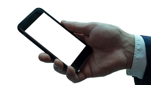 Isolated businessman hand with black smartphone. White screen.