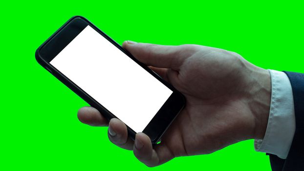 Isolated businessman hand with black smartphone. White screen.