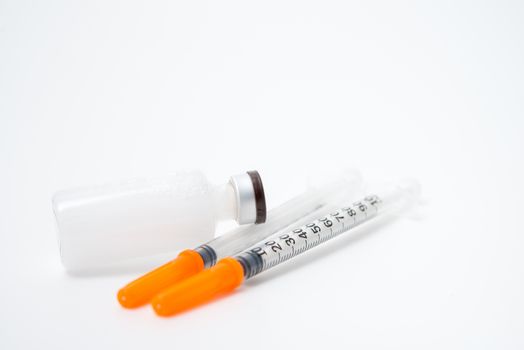 Insulin ampoule with syringe lie