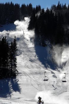 Ski track on sunny winter day on the mountanin