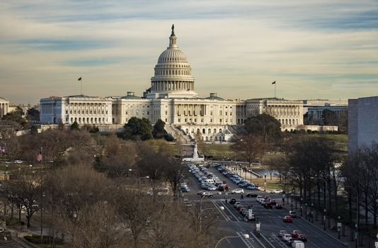 View of Capitol Hill from Constitution Ave in Washington DC, USA