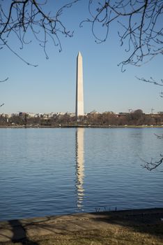 A photograph of the Washington Monument in Washington DC. It was taken on a cold but sunny day in Autumn Fall .