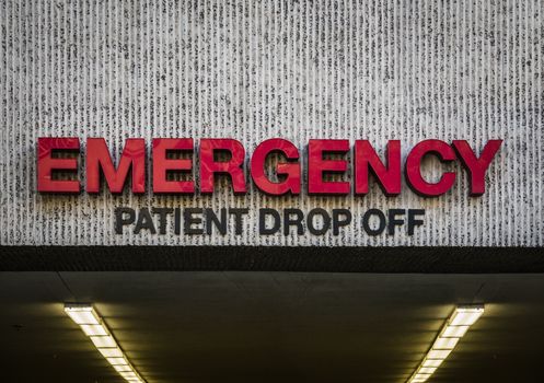 Healthcare Image Of An Emergency Patient Drop Off Sign At A Hospital