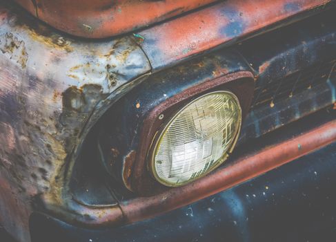 Detail Of The Headlight Of A Rusty Old Vintage Truck