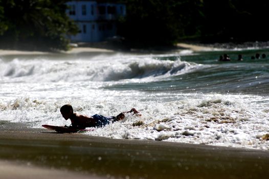 Waves on the beach on sunny summer day