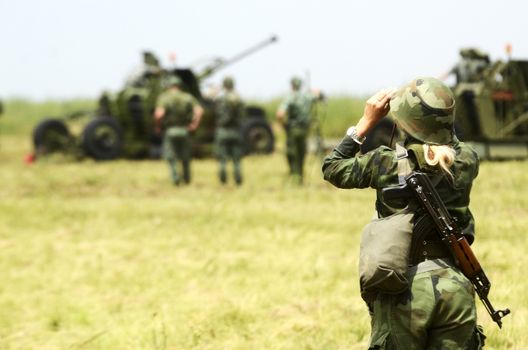 Back view on woman in the Serbian army