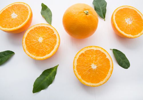 Fresh orange citrus fruit on white background. Top view