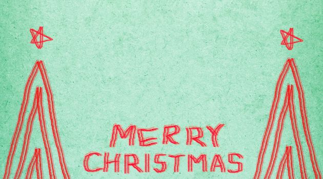 Christmas background. Easy brush illustration paint ongreen tone paper textures background.