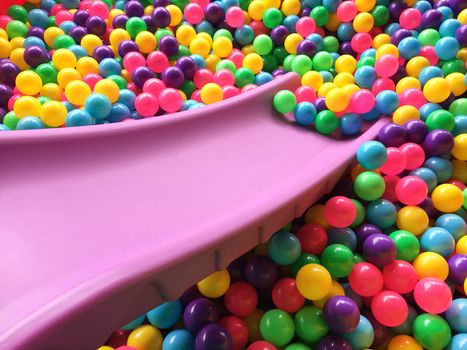 dry children's pool with colorful balls