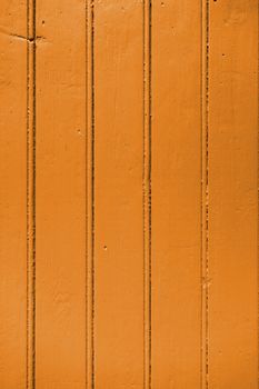 Old wood board painted orange background texture