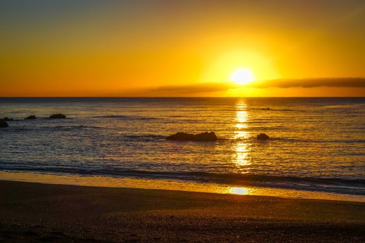 Sunset on Kaikoura beach, New Zealand southern island