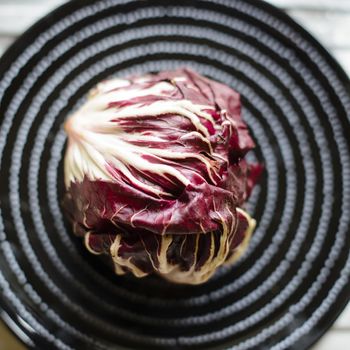 red and fresh chicory close up view