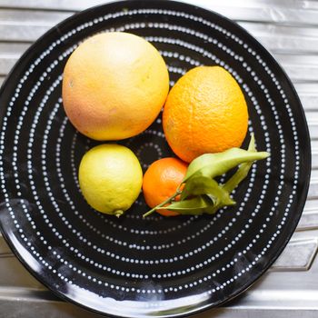 dish with citrus orange and grapefruit citrus