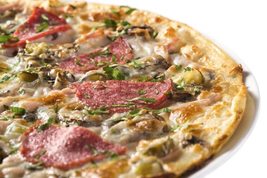 Tasty pizza with sausage, mushrooms and cucumber, isolated