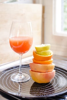 citrus fruit squeezed in the kitchen stacked peels to form a tower, citrus juice vitamin