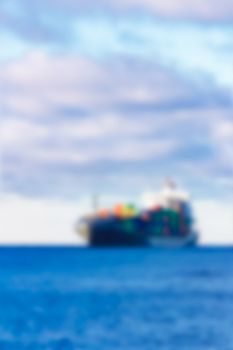 Cargo ship - soft lens bokeh image. Defocused background