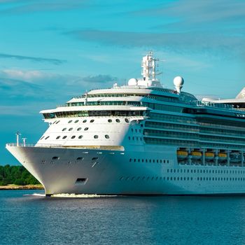 Luxury cruise liner underway. Tour travel and spa services