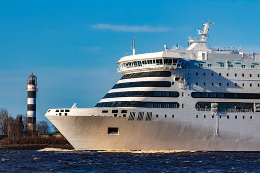 White cruise liner sailing on a clear day