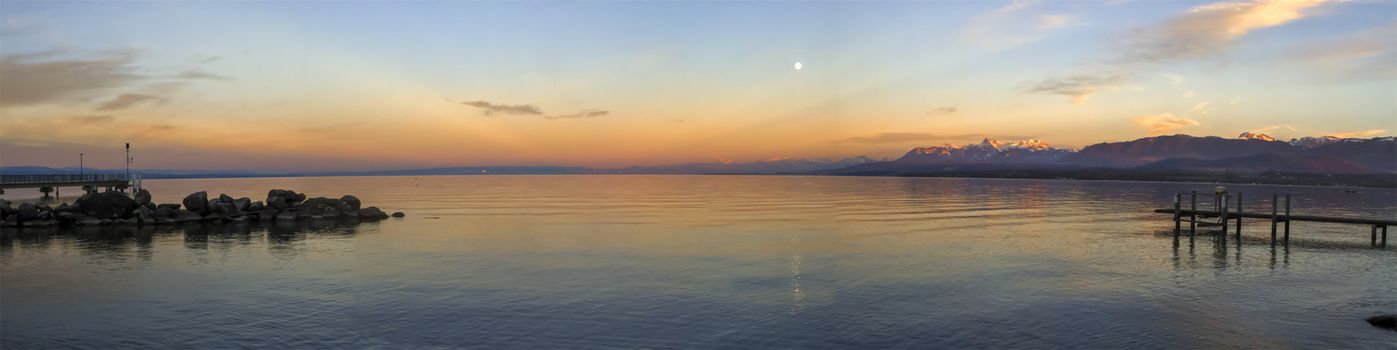 Sunset with beautiful moon over Leman or Geneva lake, Excenevex, France