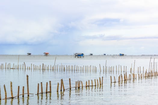 Landscape fishing cottage in sea .