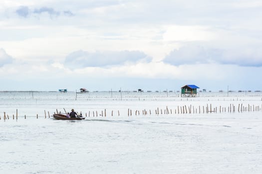 Landscape fishing cottage in sea .