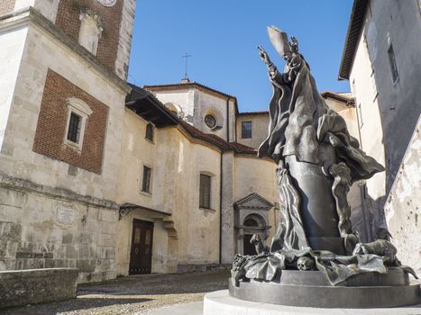 statue of Pope Paul VI to the sacred mountain of Varese, unesco heritage of humanity