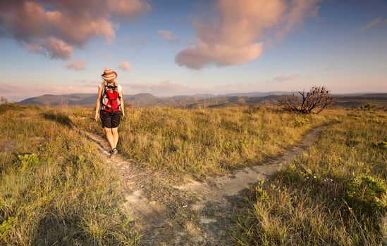 Female bushwalker hiking in the area of the Blue Mountains known as The Explorers Way