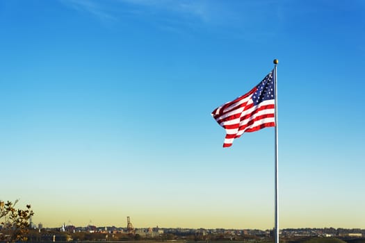 United States of America national Flag waving. Patriotic concept. Outdoor shot