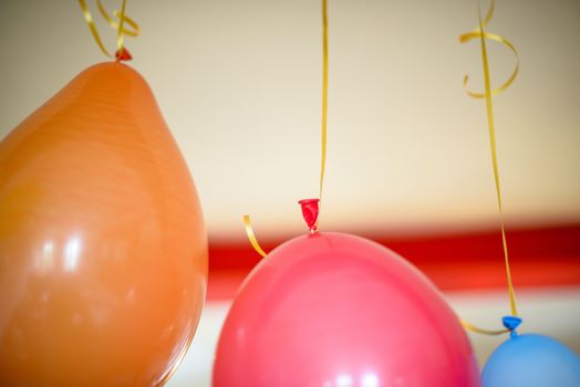 colorful balloons for birthday party hanging at home