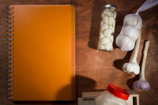 Varied garlic package on a wooden background