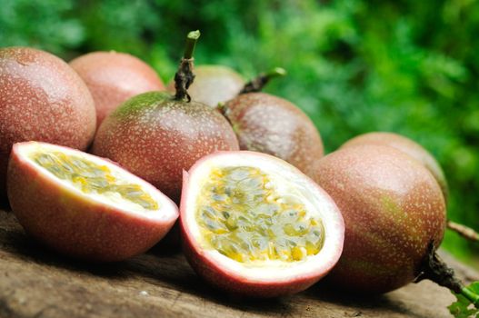 Passion fruit on wooden table.