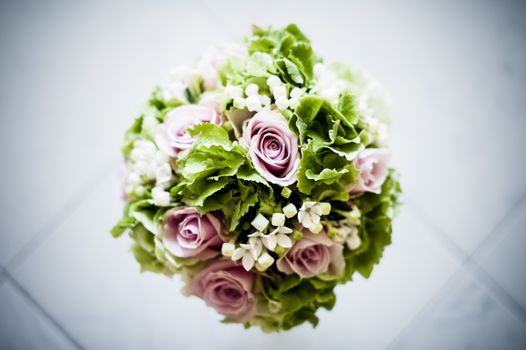 bridal bouquet with white and pink and green flowers, hydrangeas, roses