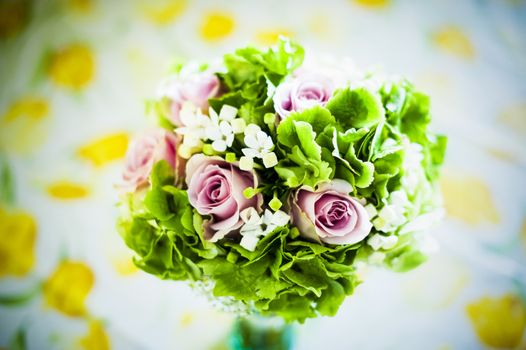 bridal bouquet with white and pink and green flowers, hydrangeas, roses