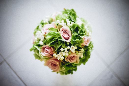 bridal bouquet with white and pink and green flowers, hydrangeas, roses