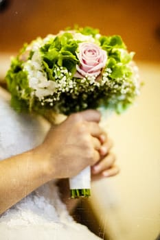 bridal bouquet with white and pink and green flowers, hydrangeas, roses