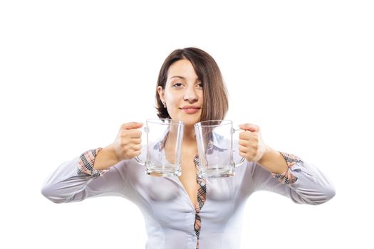 business girl holding two empty beer glasses against white background