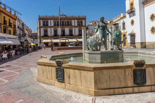 PLAZA DEL SOCORRO AND BLAS INFANTE in the city of Ronda Spain, Europe on a hot summer day with clear blue skies